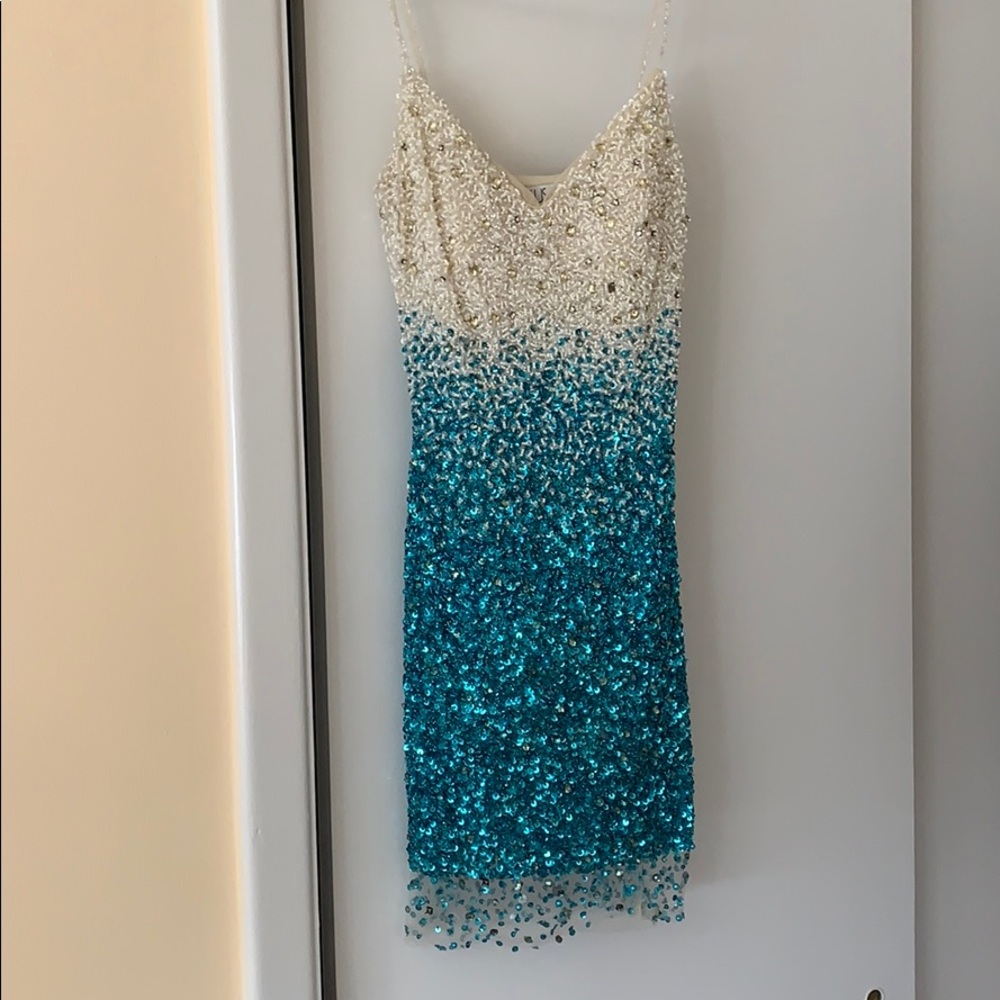 Musani Couture mini cocktail dress.